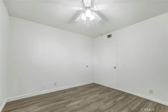 939 W Pine St Unit 44/D, Upland, CA 91786 - empty room with wood finished floors and a ceiling fan