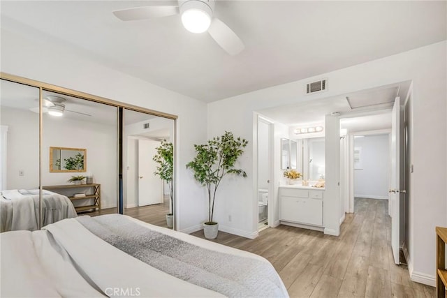 939 W Pine St Unit 44/D, Upland, CA 91786 - bedroom with light wood-style floors, a closet, ceiling fan, and connected bathroom