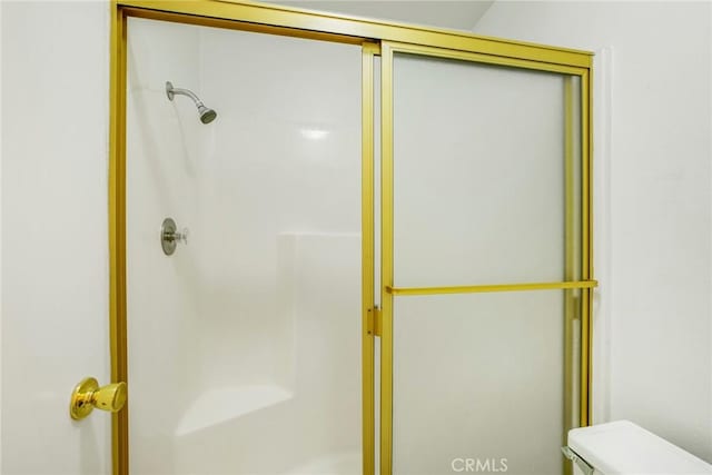 939 W Pine St Unit 44/D, Upland, CA 91786 - full bathroom featuring a stall shower and toilet
