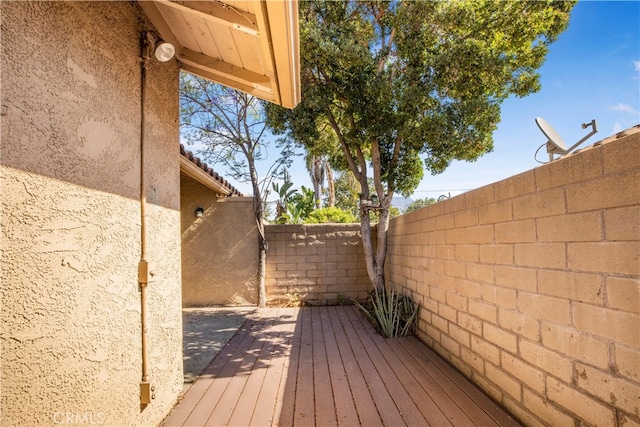 939 W Pine St Unit 44/D, Upland, CA 91786 - wooden terrace with a fenced backyard