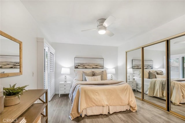 939 W Pine St Unit 44/D, Upland, CA 91786 - bedroom featuring light wood-type flooring, a closet, and a ceiling fan