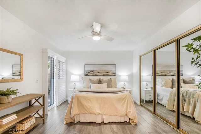 939 W Pine St Unit 44/D, Upland, CA 91786 - bedroom featuring wood finished floors, a ceiling fan, a closet, and access to exterior