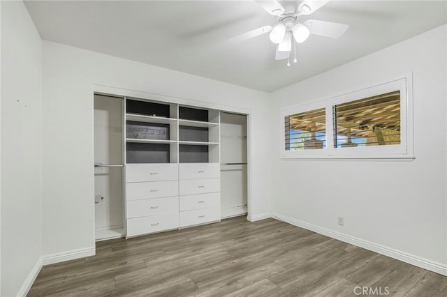 939 W Pine St Unit 44/D, Upland, CA 91786 - unfurnished bedroom featuring wood finished floors, a ceiling fan, and a closet
