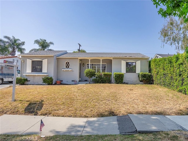 10348 Woodbridge St, Toluca Lake, CA 91602 - single story home featuring stucco siding and a front lawn