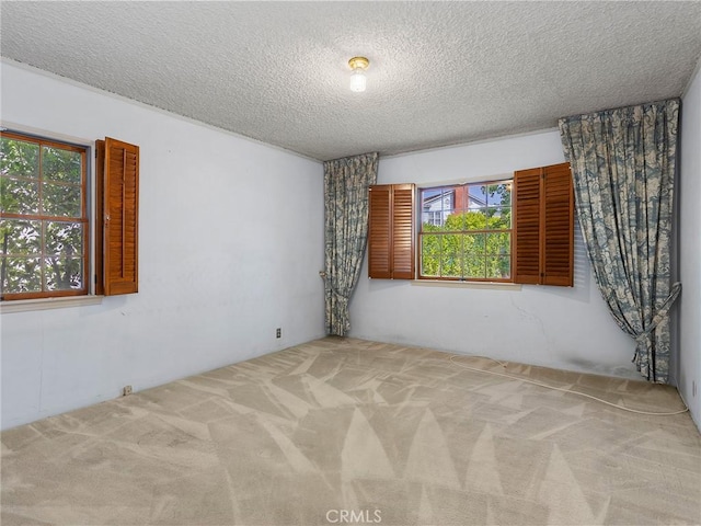 10348 Woodbridge St, Toluca Lake, CA 91602 - carpeted spare room with a textured ceiling