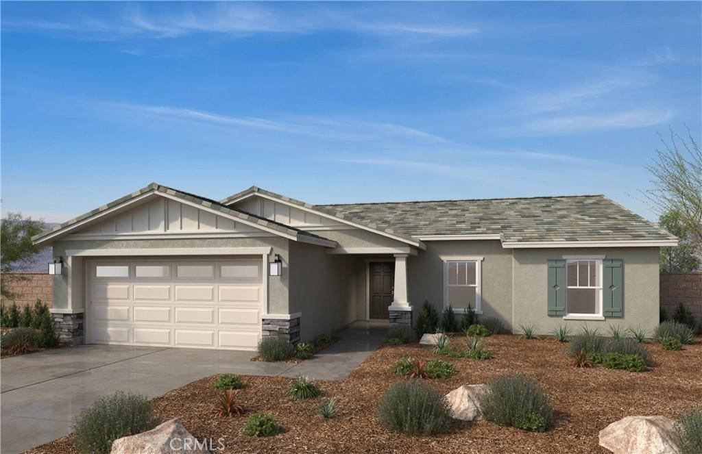 1645 Westfork Way, San Jacinto, CA 92582 - view of front of house with an attached garage, stone siding, driveway, a shingled roof, and stucco siding