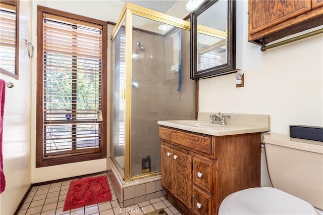 16533 Nordhoff St, North Hills, CA 91343 - bathroom with a stall shower, vanity, and tile patterned floors