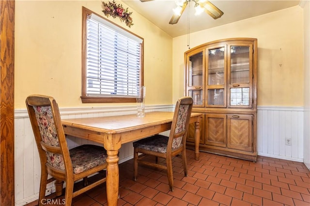 16533 Nordhoff St, North Hills, CA 91343 - dining space featuring a wainscoted wall and a ceiling fan