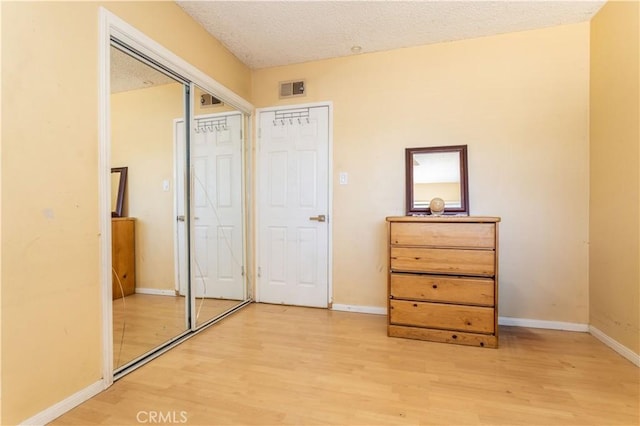 16533 Nordhoff St, North Hills, CA 91343 - bedroom with light wood-type flooring and a closet