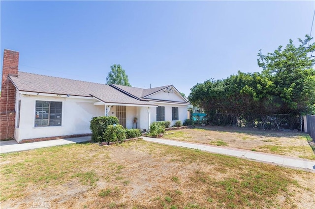 16533 Nordhoff St, North Hills, CA 91343 - ranch-style house with stucco siding, a chimney, and a shingled roof