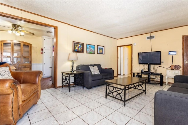 16533 Nordhoff St, North Hills, CA 91343 - living area featuring ornamental molding, a ceiling fan, and a textured ceiling