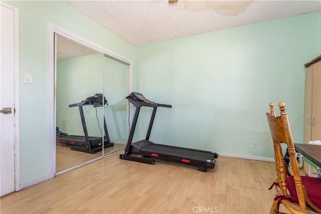 16533 Nordhoff St, North Hills, CA 91343 - exercise area with wood finished floors and a textured ceiling