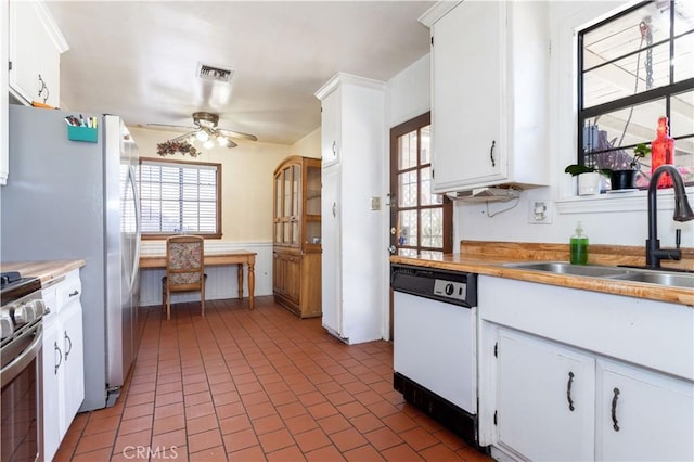 16533 Nordhoff St, North Hills, CA 91343 - kitchen featuring dishwasher, light countertops, gas range, and ceiling fan