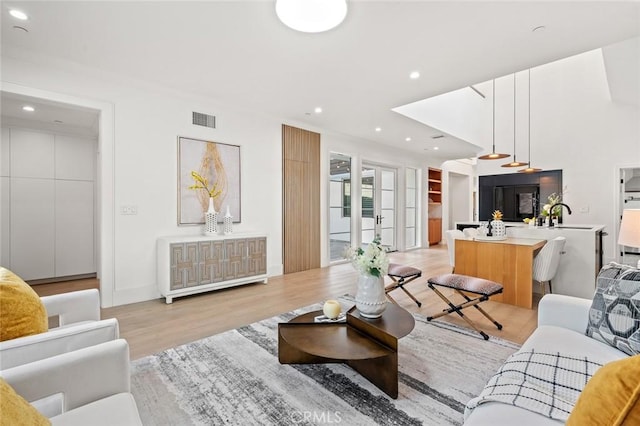 6204 Oak Ave, Temple City, CA 91780 - living room featuring light wood-style floors and recessed lighting