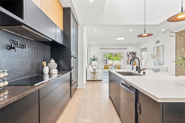 6204 Oak Ave, Temple City, CA 91780 - kitchen featuring modern cabinets, recessed lighting, dishwasher, light wood-style floors, and an island with sink