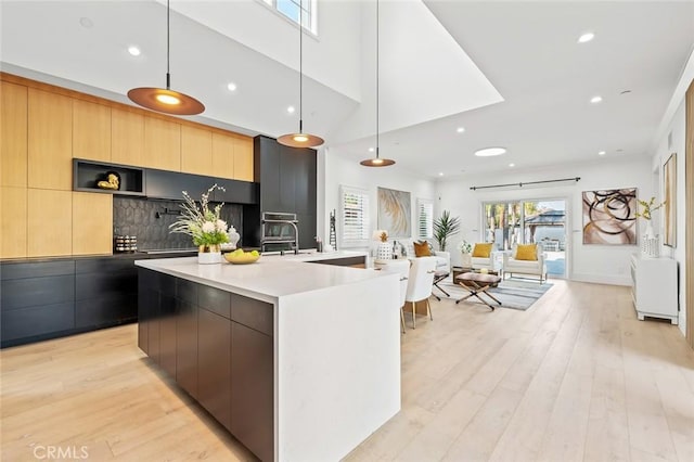 6204 Oak Ave, Temple City, CA 91780 - kitchen with modern cabinets, healthy amount of natural light, light wood-style flooring, and recessed lighting