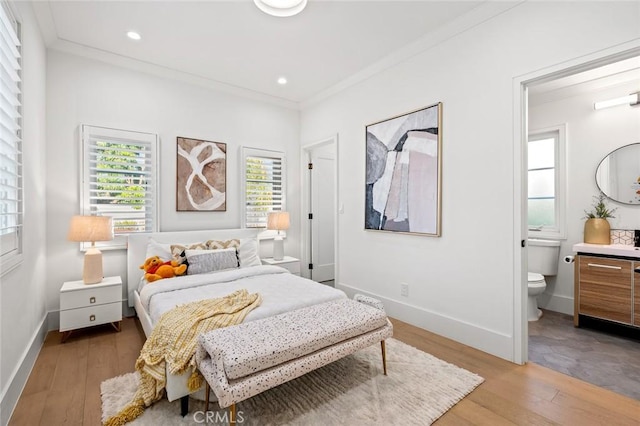 6204 Oak Ave, Temple City, CA 91780 - bedroom with light wood-type flooring, crown molding, ensuite bathroom, and recessed lighting