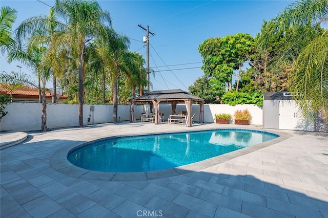 6204 Oak Ave, Temple City, CA 91780 - view of swimming pool featuring a gazebo, a patio, a storage unit, and a fenced backyard