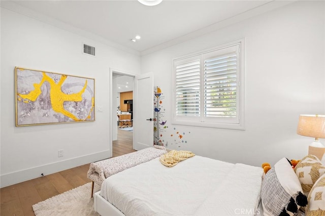 6204 Oak Ave, Temple City, CA 91780 - bedroom featuring wood finished floors, ornamental molding, and recessed lighting
