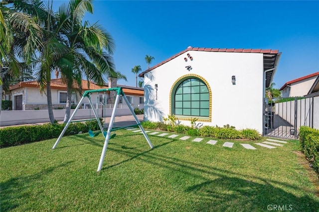 6204 Oak Ave, Temple City, CA 91780 - view of front of home with a playground, stucco siding, and stone siding