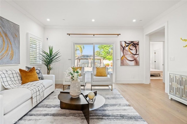 6204 Oak Ave, Temple City, CA 91780 - living area featuring healthy amount of natural light, wood finished floors, crown molding, and recessed lighting