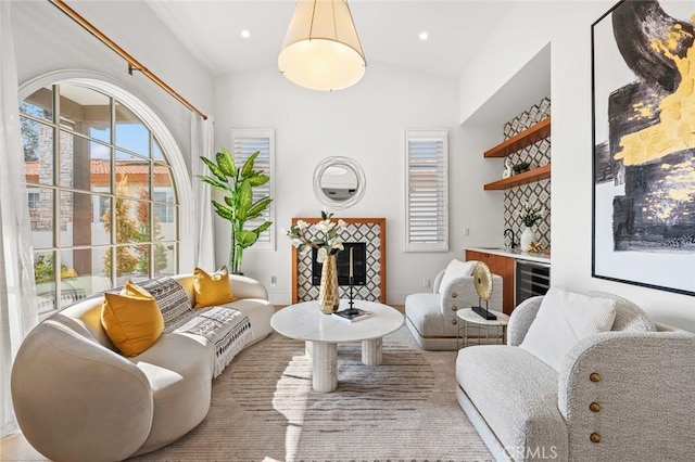 6204 Oak Ave, Temple City, CA 91780 - living room featuring plenty of natural light, lofted ceiling, a tiled fireplace, and wine cooler