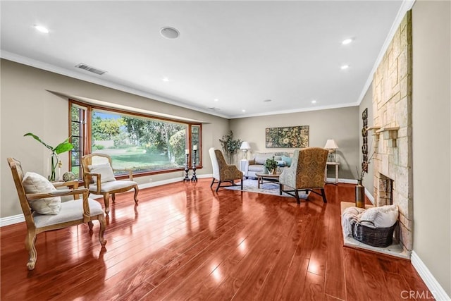 1310 Santa Margarita Dr, Arcadia, CA 91006 - living area featuring crown molding, wood finished floors, a stone fireplace, and recessed lighting