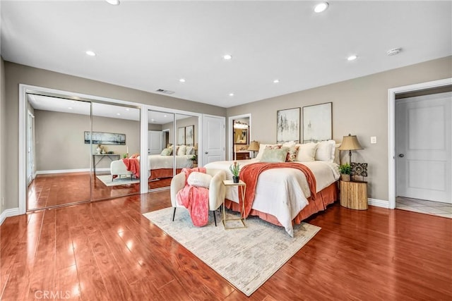 1310 Santa Margarita Dr, Arcadia, CA 91006 - bedroom featuring two closets, wood finished floors, and recessed lighting