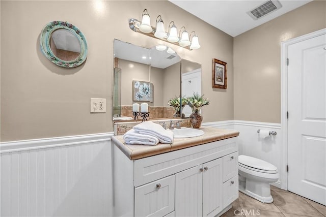 1310 Santa Margarita Dr, Arcadia, CA 91006 - bathroom featuring vanity, a wainscoted wall, and tile patterned flooring