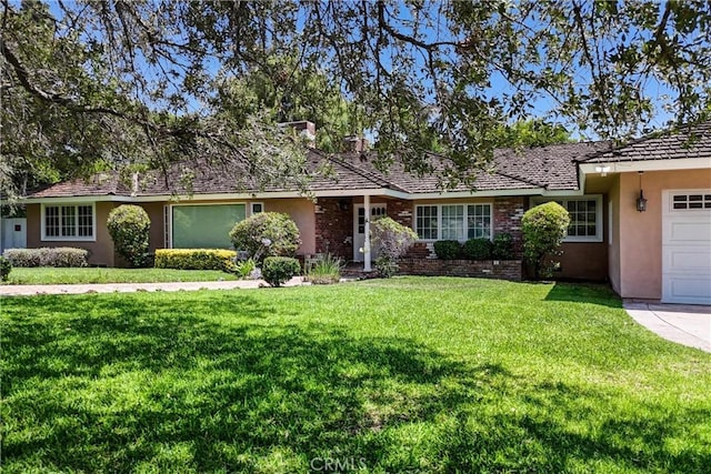 1310 Santa Margarita Dr, Arcadia, CA 91006 - single story home with brick siding, an attached garage, stucco siding, and a front yard