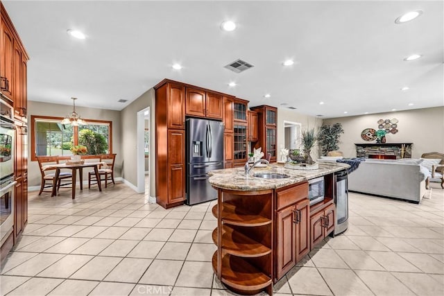 1310 Santa Margarita Dr, Arcadia, CA 91006 - kitchen with open shelves, light tile patterned floors, light stone countertops, stainless steel appliances, and recessed lighting