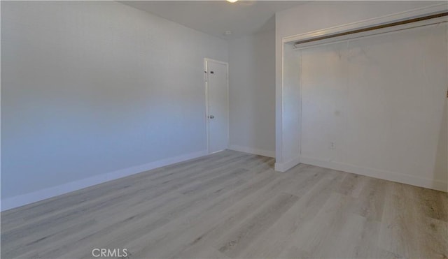 460 E 2nd St, San Jacinto, CA 92583 - unfurnished bedroom with light wood-type flooring and a closet