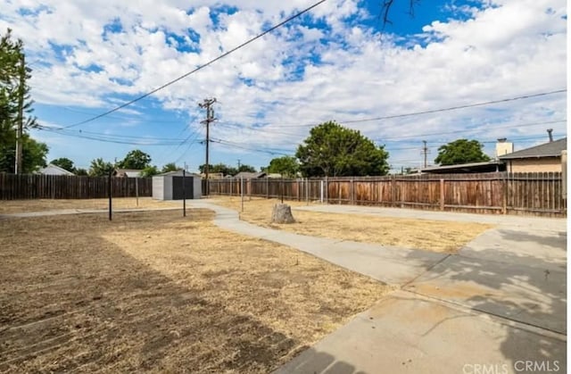 460 E 2nd St, San Jacinto, CA 92583 - fenced backyard with a shed