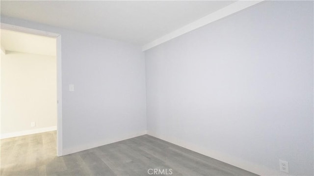 460 E 2nd St, San Jacinto, CA 92583 - empty room featuring wood finished floors and baseboards