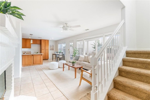 391 Franciscan Way, Oceanside, CA 92057 - living area with stairway, a ceiling fan, and light tile patterned floors