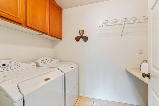 391 Franciscan Way, Oceanside, CA 92057 - laundry area with cabinet space, independent washer and dryer, and light tile patterned floors