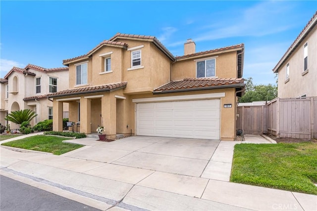 391 Franciscan Way, Oceanside, CA 92057 - mediterranean / spanish home with stucco siding, an attached garage, a chimney, driveway, and a tile roof
