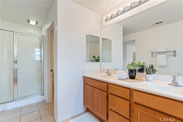 391 Franciscan Way, Oceanside, CA 92057 - bathroom with double vanity, a stall shower, and tile patterned floors