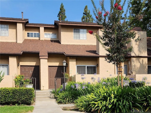 2208 Paseo Tepic, West Covina, CA 91792 - view of front of property with stucco siding and a shingled roof