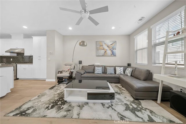 20950 Cornerstone Dr, Walnut, CA 91789 - living room featuring light wood-style floors, recessed lighting, and a ceiling fan
