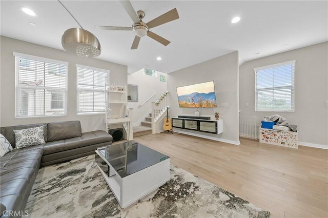 20950 Cornerstone Dr, Walnut, CA 91789 - living area with wood finished floors, plenty of natural light, a ceiling fan, stairs, and recessed lighting