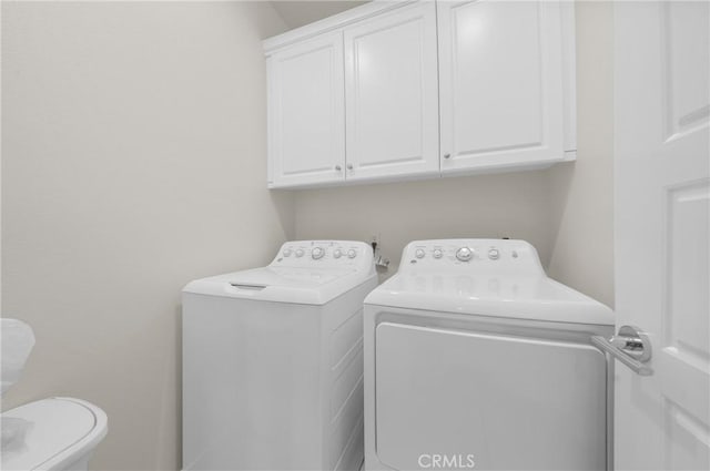 20950 Cornerstone Dr, Walnut, CA 91789 - washroom featuring washer and dryer and cabinet space