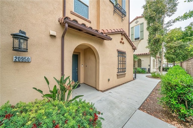 20950 Cornerstone Dr, Walnut, CA 91789 - doorway to property with stucco siding
