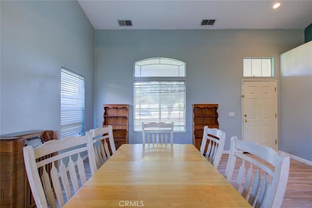 1166 Labrador Ct, Newman, CA 95360 - dining room with healthy amount of natural light, wood finished floors, and recessed lighting