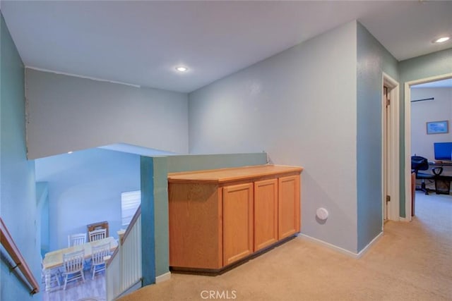 1166 Labrador Ct, Newman, CA 95360 - hall featuring light carpet, recessed lighting, and an upstairs landing