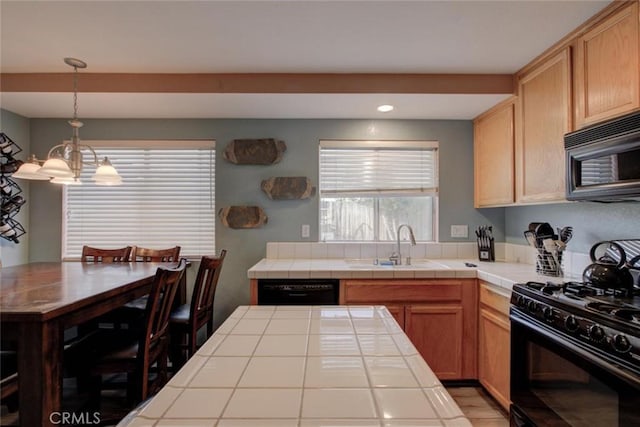 1166 Labrador Ct, Newman, CA 95360 - kitchen featuring black appliances, tile countertops, recessed lighting, decorative light fixtures, and light wood-style flooring