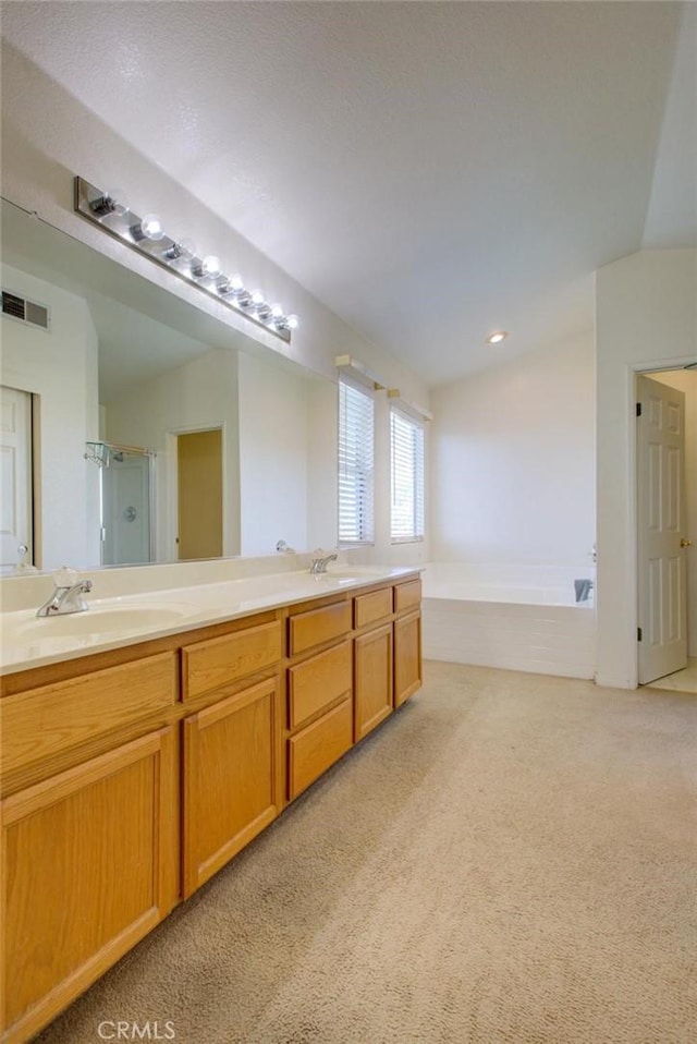 1166 Labrador Ct, Newman, CA 95360 - full bath with carpet flooring, double vanity, a shower with door, and a bath