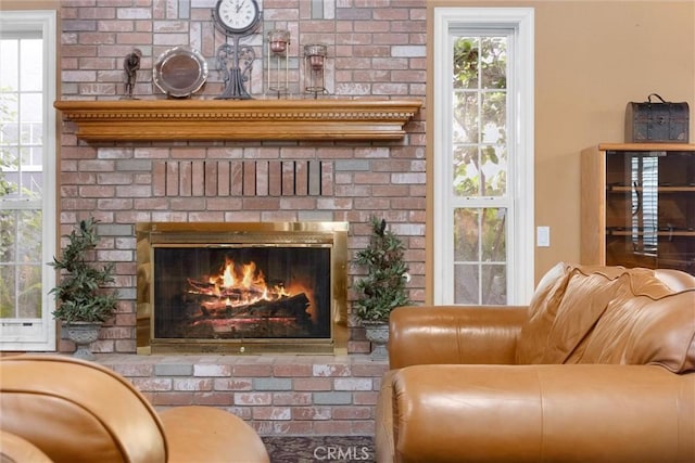8905 Saint Cloud Ln, Bakersfield, CA 93311 - living room featuring a brick fireplace and plenty of natural light