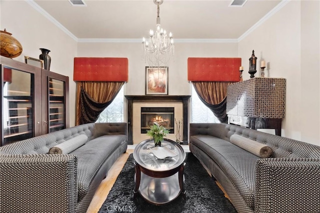 8905 Saint Cloud Ln, Bakersfield, CA 93311 - living area featuring wood finished floors, a chandelier, ornamental molding, and a tile fireplace