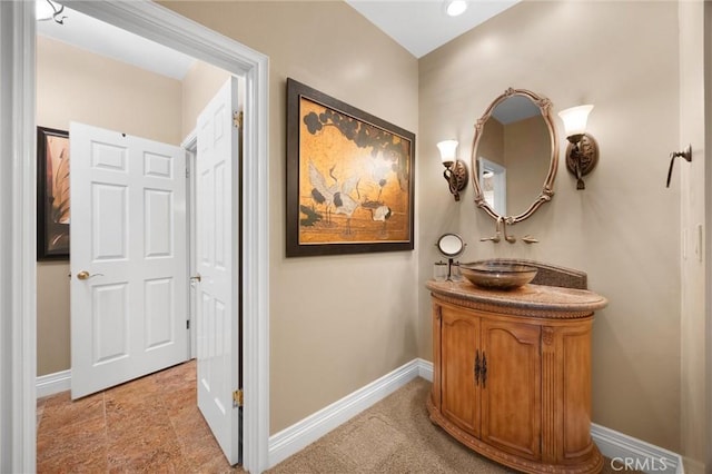 8905 Saint Cloud Ln, Bakersfield, CA 93311 - bathroom with vanity and baseboards